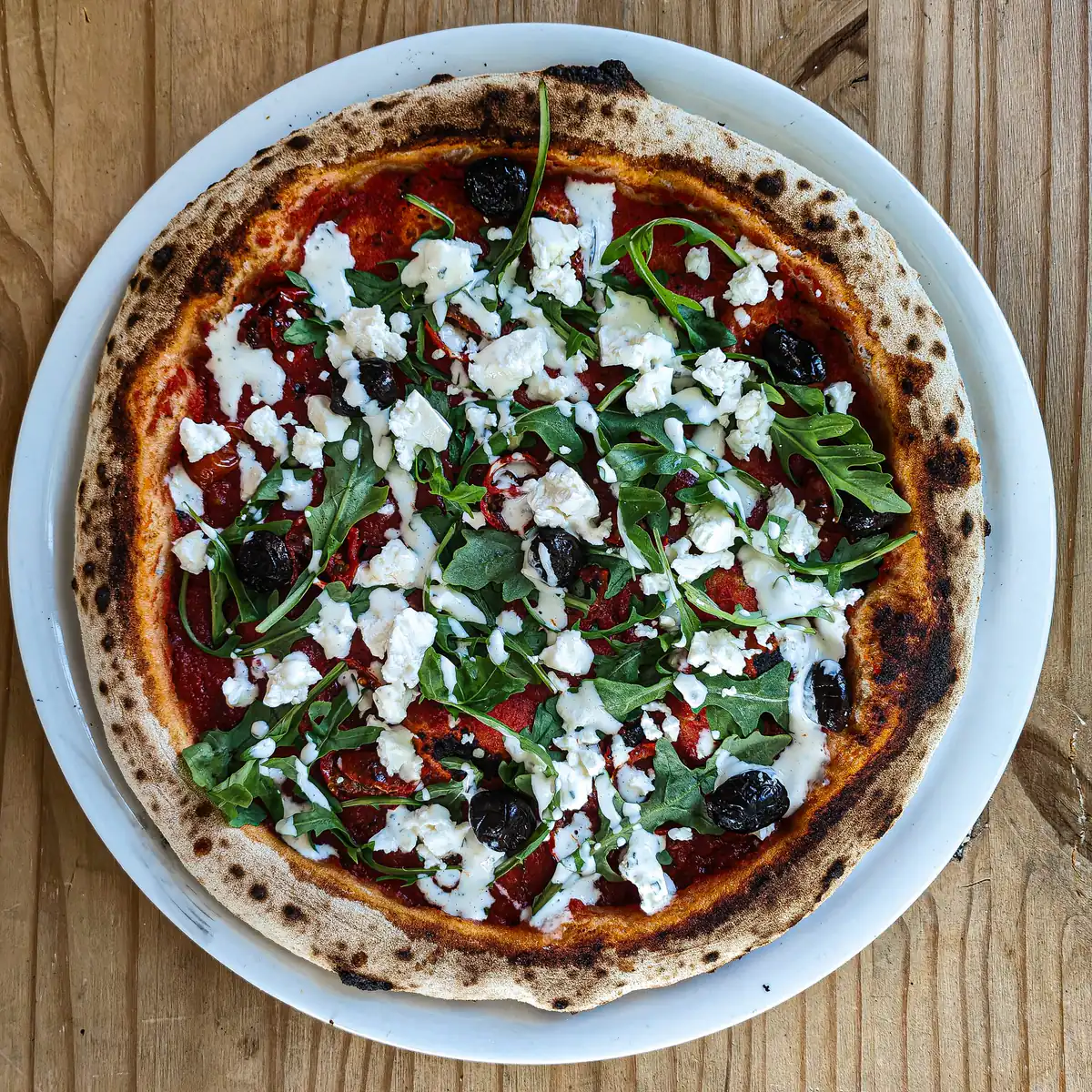 Pizza artisanale Régine cuite au four à bois — atelier pizza Fontaines-sur-Saône